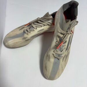 Adidas Beige and Gray Sneakers with Red Accent